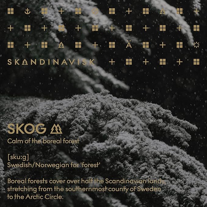 Skandinavisk Skog 'Forest' Scented Candle with 2 Wicks. Fragrance Notes: Pine Needles and Fir Cones, Birch Sap and Lily of The Valley. 14.1 oz.