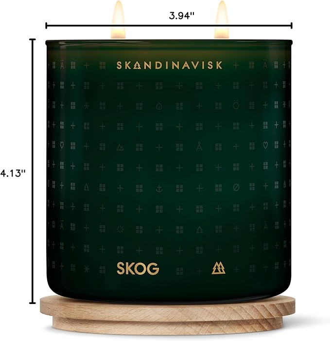Skandinavisk Skog 'Forest' Scented Candle with 2 Wicks. Fragrance Notes: Pine Needles and Fir Cones, Birch Sap and Lily of The Valley. 14.1 oz.